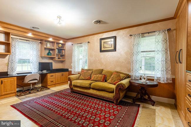 10246 Golf Course Road Fayetteville, PA 17222 - Photo 22 of 62 a living room with furniture and a window