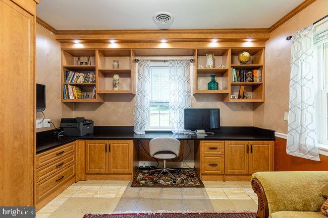 10246 Golf Course Road Fayetteville, PA 17222 - Photo 24 of 62 a kitchen with stainless steel appliances kitchen island granite countertop a stove and a sink