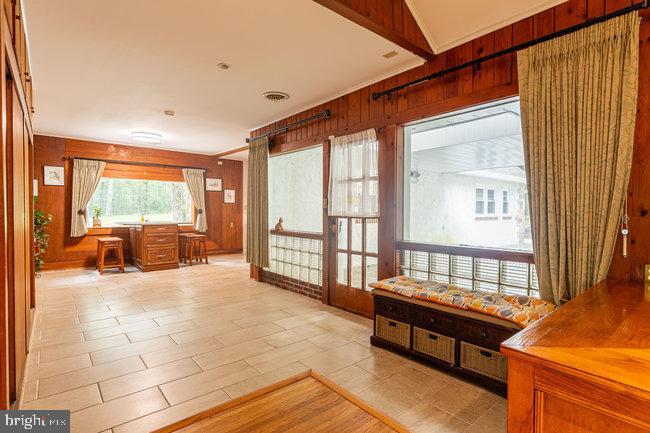 10246 Golf Course Road Fayetteville, PA 17222 - Photo 29 of 62 a balcony with furniture and large window