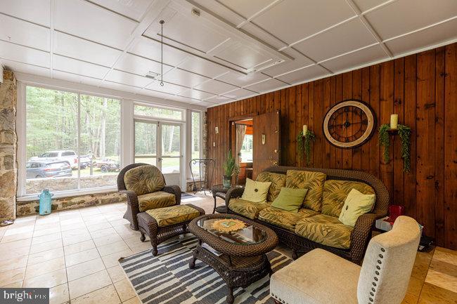 10246 Golf Course Road Fayetteville, PA 17222 - Photo 46 of 62 a living room with furniture and a large window