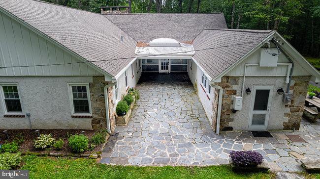 10246 Golf Course Road Fayetteville, PA 17222 - Photo 50 of 62 a view of a house with a patio