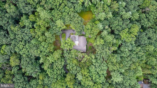 10246 Golf Course Road Fayetteville, PA 17222 - Photo 55 of 62 an aerial view of a house with a yard