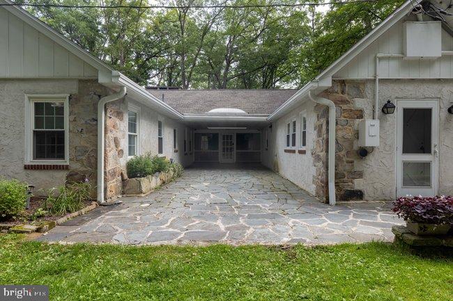 10246 Golf Course Road Fayetteville, PA 17222 - Photo 6 of 62 a view of a house with yard and a garden