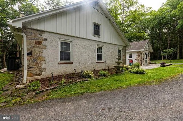 a front view of house with yard