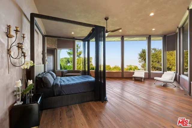 a bathroom with a bathtub shower sink and toilet