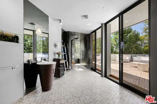 a view of a patio on the roof deck