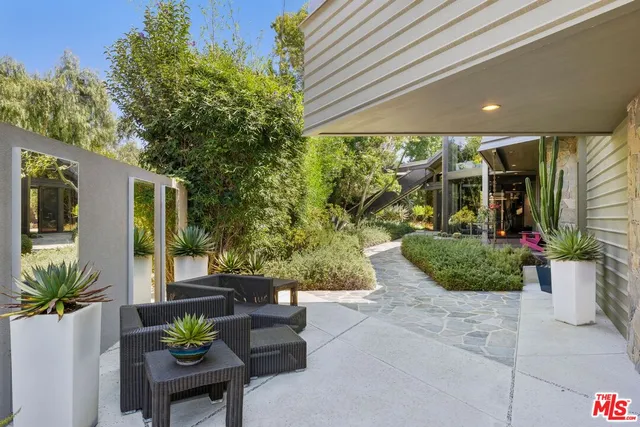 a backyard of a house with seating space