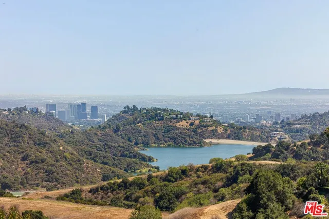 an aerial view of a house with a garden