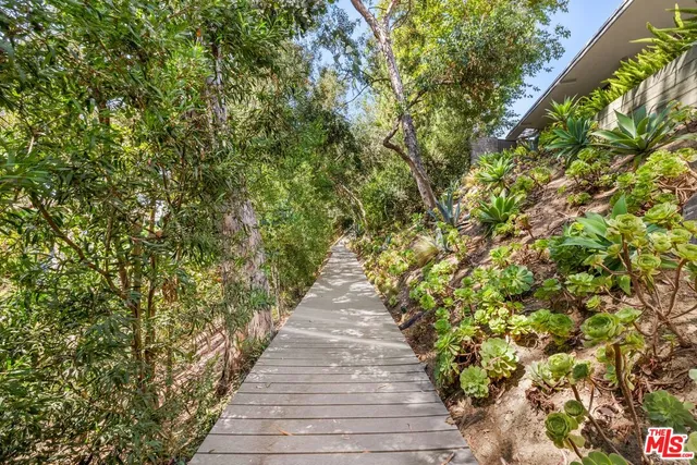 a view of a town with mountains in the background