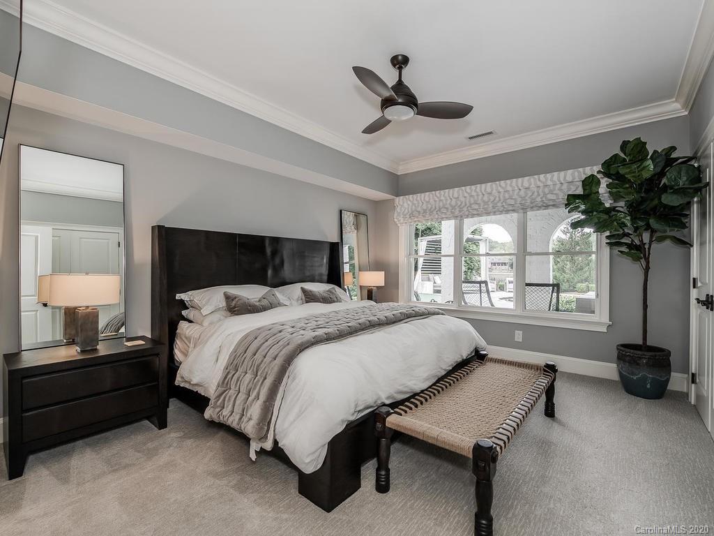 19506 Mary Ardrey Circle Cornelius, NC 28031 - Photo 20 of 36 a bedroom with a bed and a window