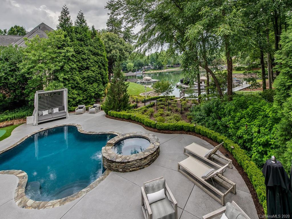 19506 Mary Ardrey Circle Cornelius, NC 28031 - Photo 30 of 36 a view of a swimming pool with a yard