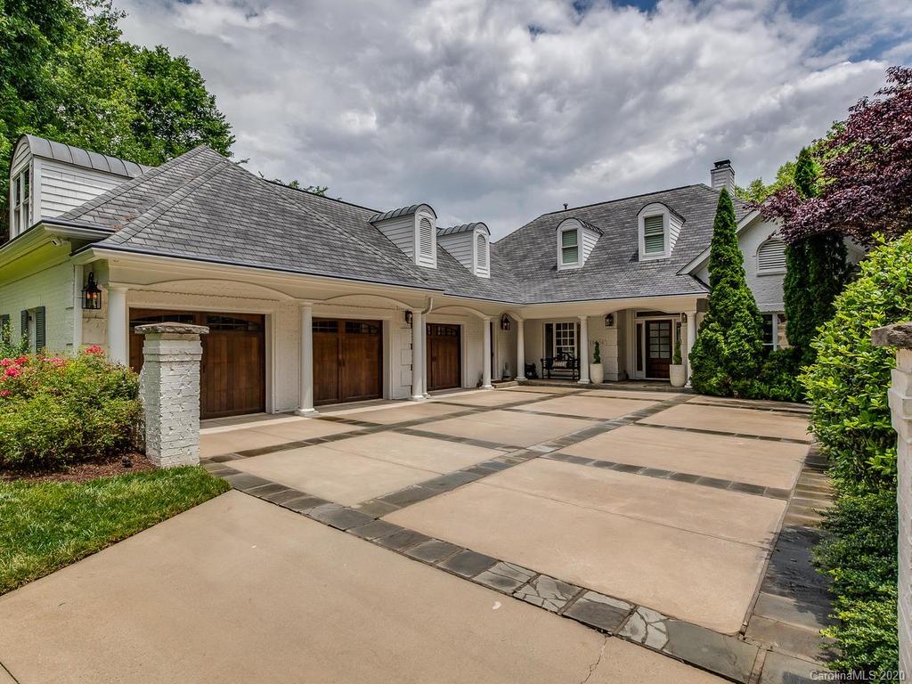 19506 Mary Ardrey Circle Cornelius, NC 28031 - Photo 32 of 36 front view of a house with a garden