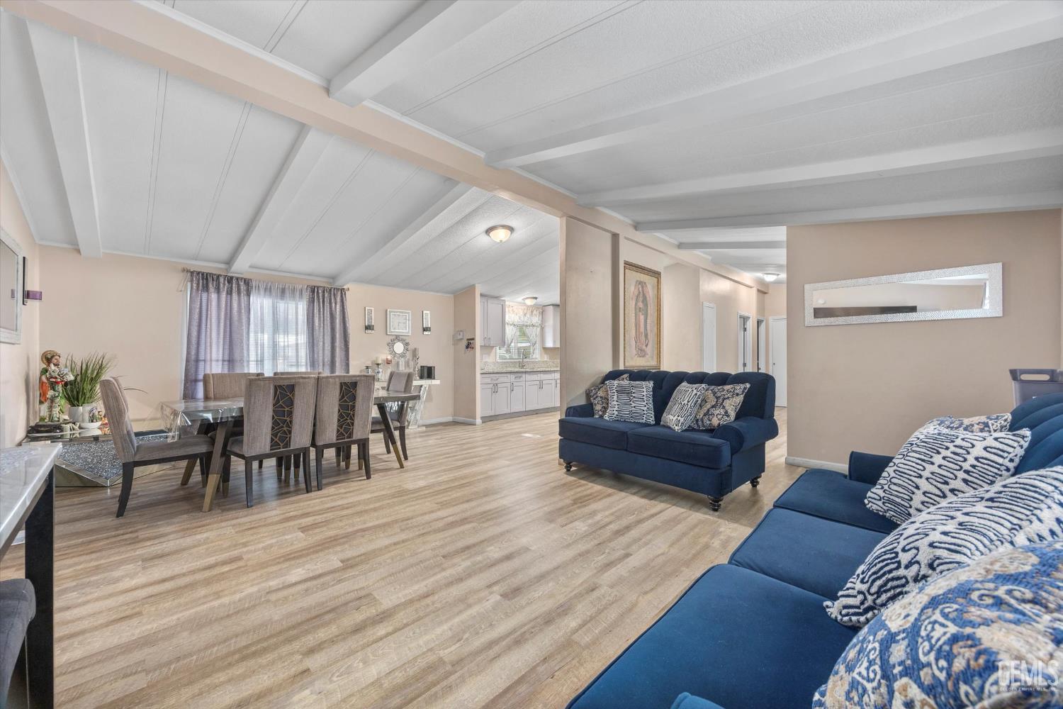 Undisclosed Address Delano, CA 93215 - Photo 12 of 43 a living room with furniture and wooden floor