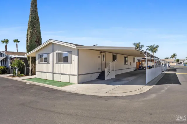 a view of a house with a park