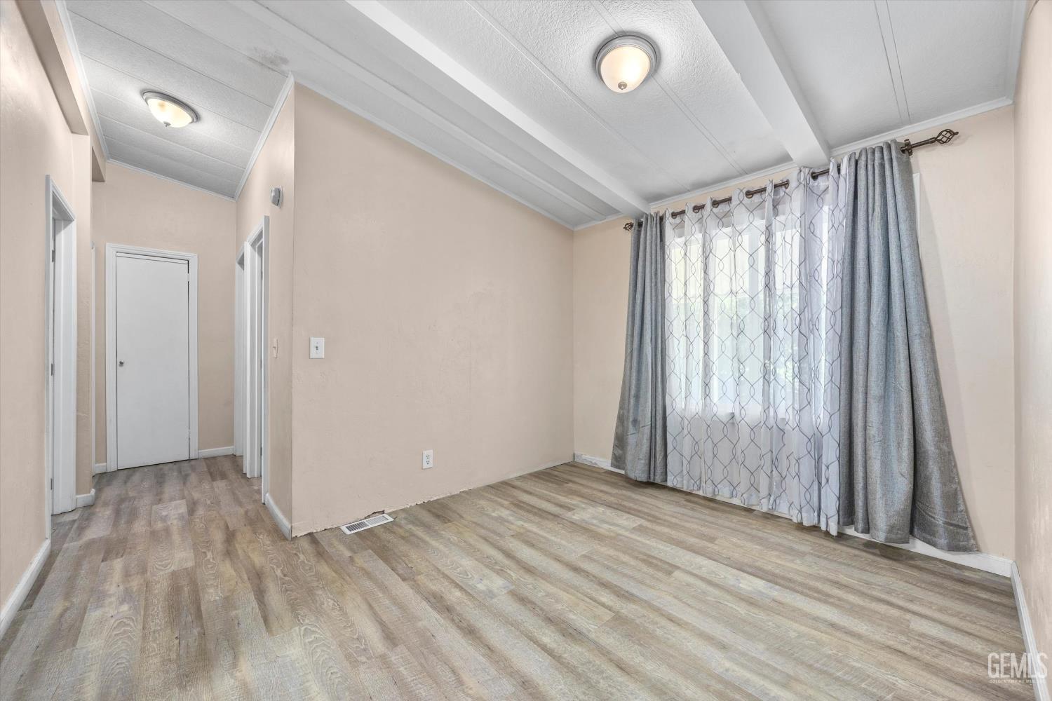 Undisclosed Address Delano, CA 93215 - Photo 21 of 43 a view of entryway with wooden floor