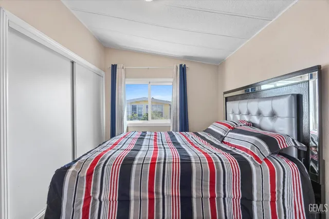 a bathroom with a sink toilet and mirror