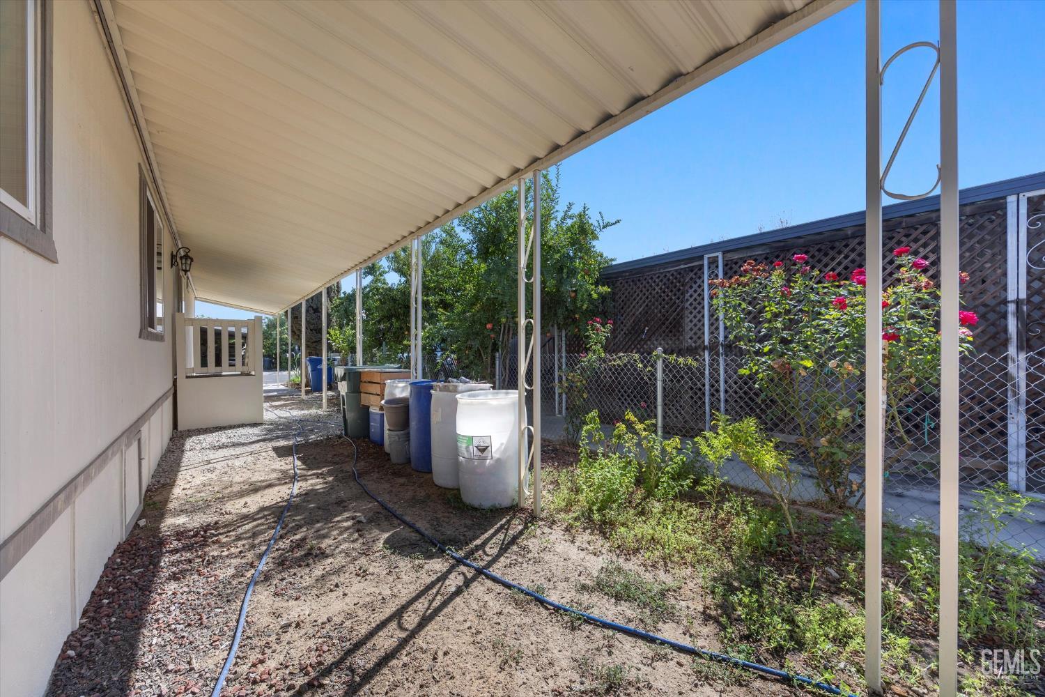 Undisclosed Address Delano, CA 93215 - Photo 38 of 43 a view of a backyard with garden