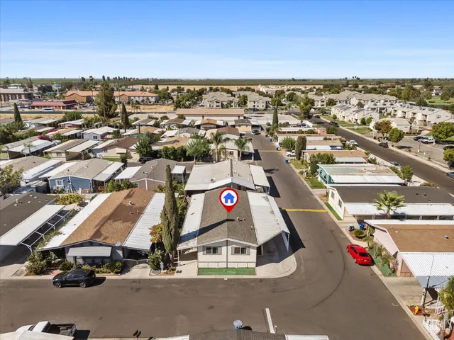 an aerial view of a city with lots of residential buildings