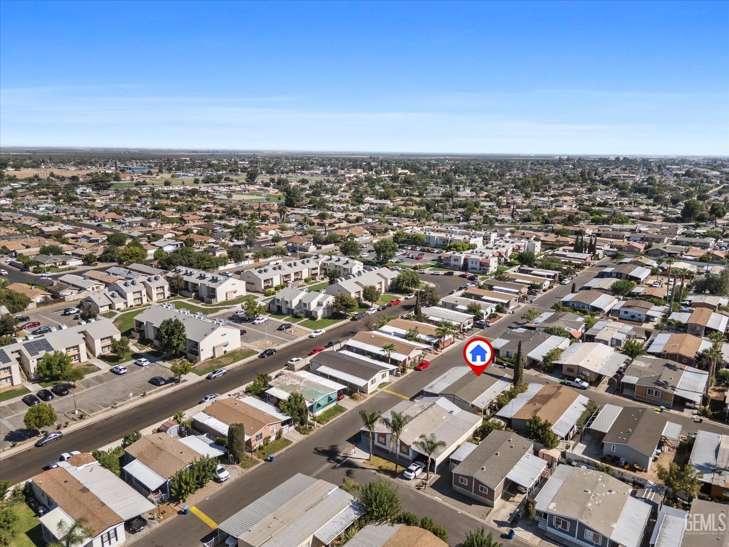 Undisclosed Address Delano, CA 93215 - Photo 40 of 43 an aerial view of a city with lots of residential buildings