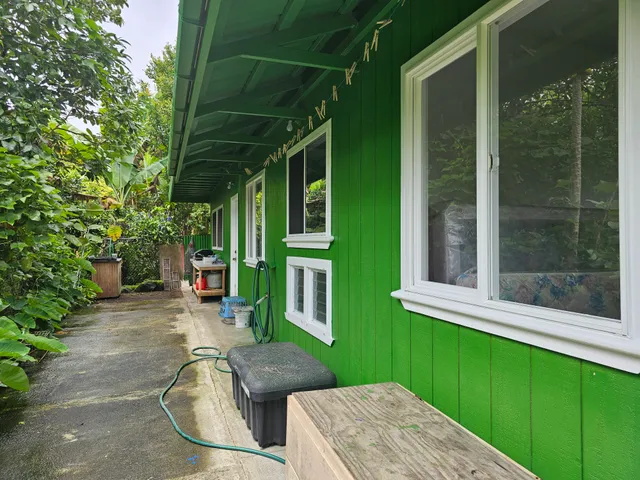 a backyard of a house with seating space