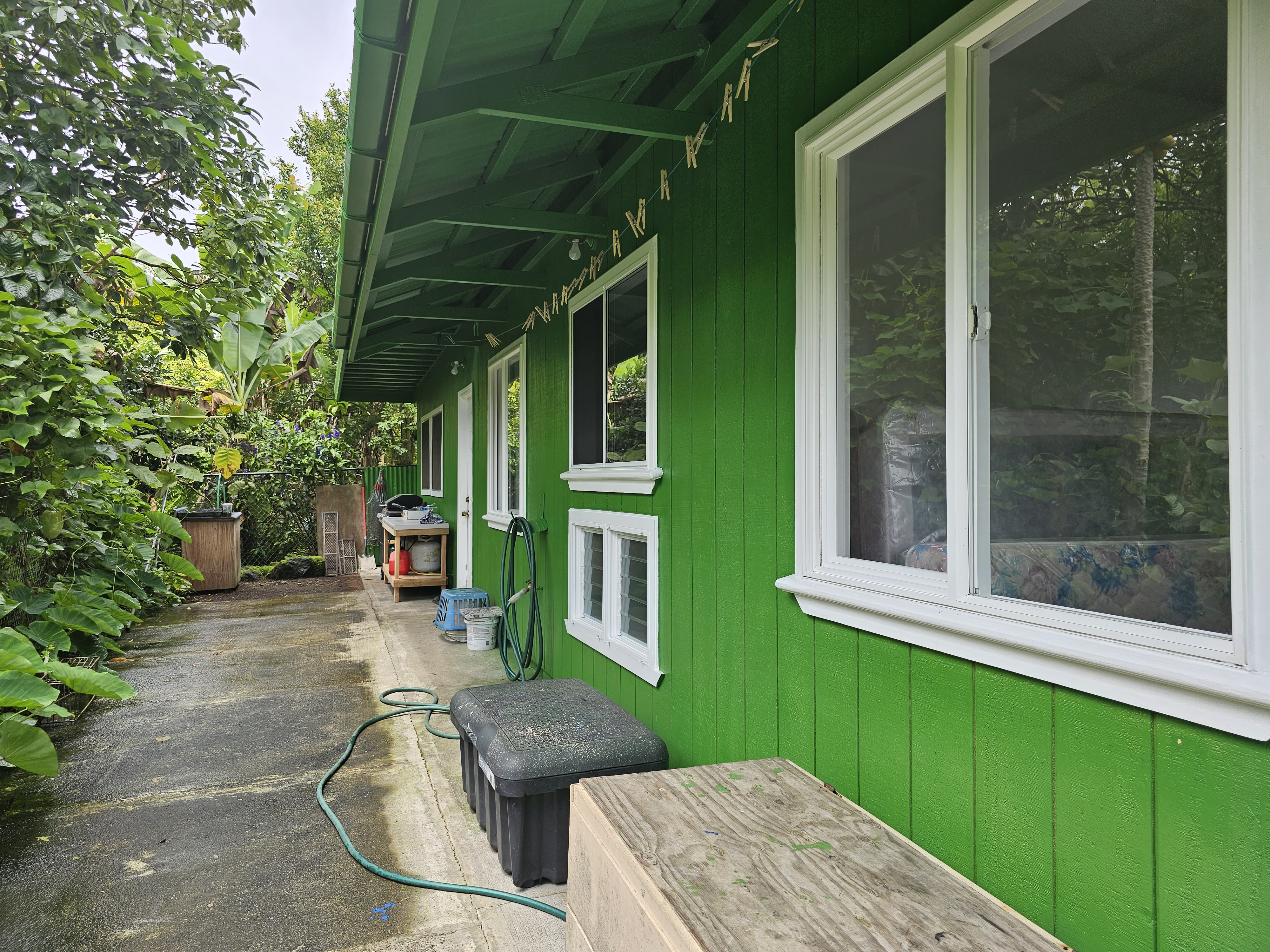 16-1754 Uhini Ana Road Pahoa, HI 96778 - Photo 3 of 21 a backyard of a house with seating space