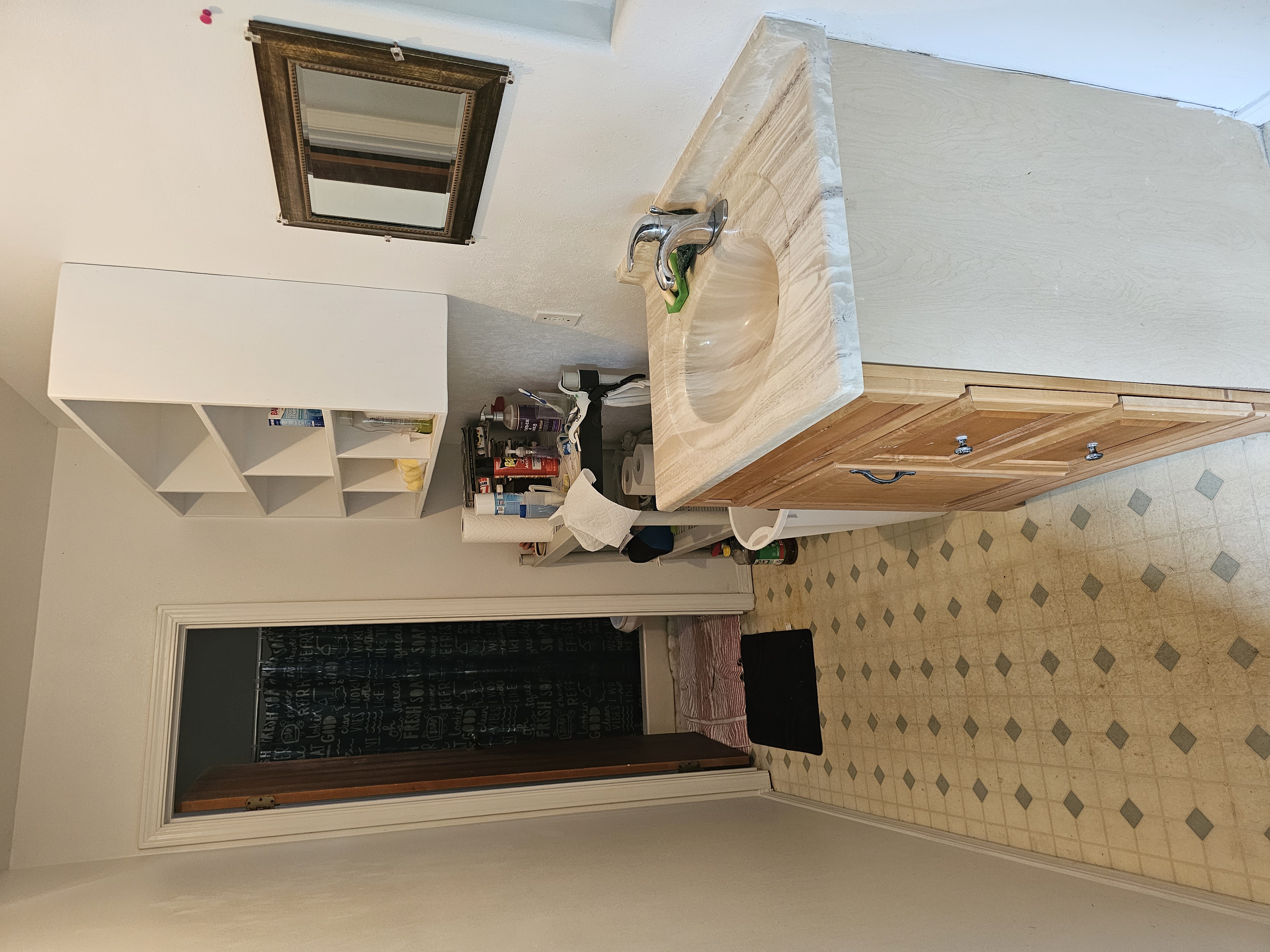 16-1754 Uhini Ana Road Pahoa, HI 96778 - Photo 6 of 21 a kitchen with a sink a stove and cabinets