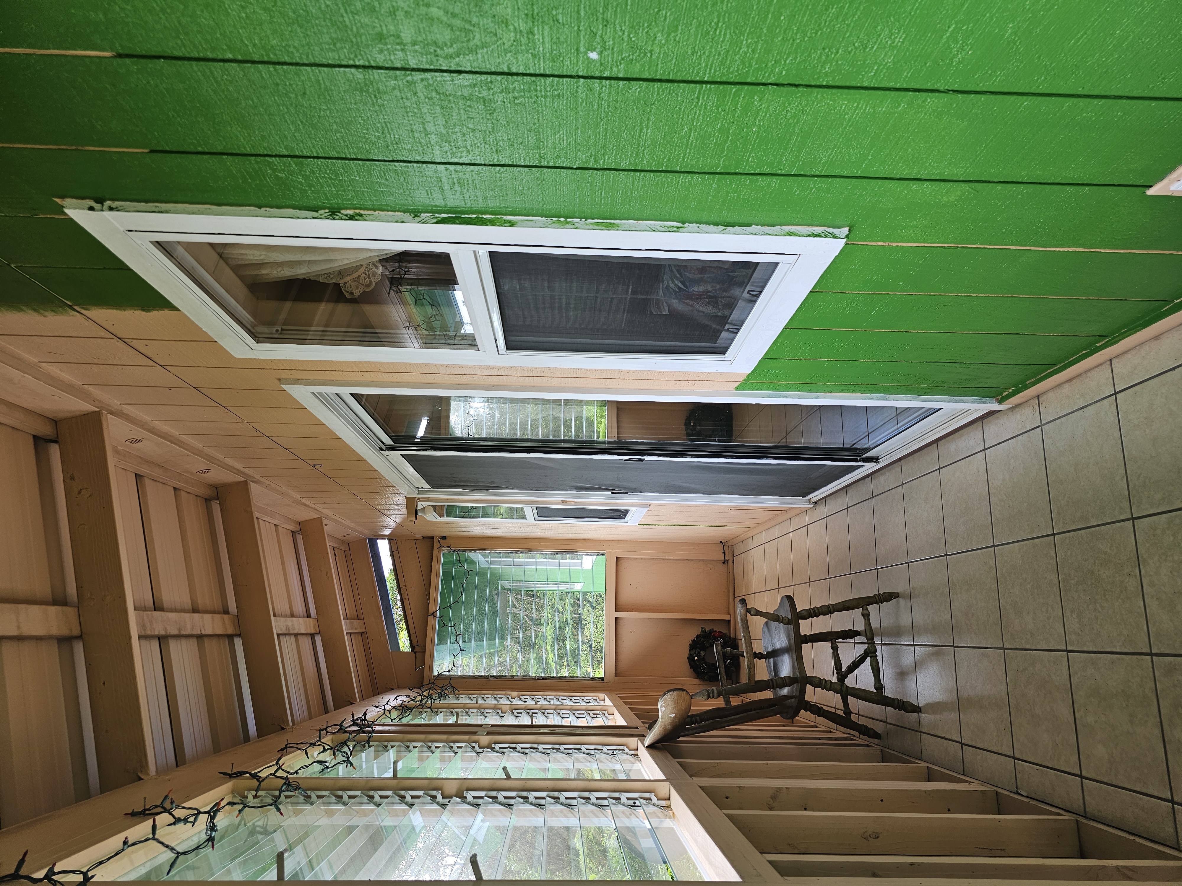 16-1754 Uhini Ana Road Pahoa, HI 96778 - Photo 8 of 21 a view of a porch with chairs and couches