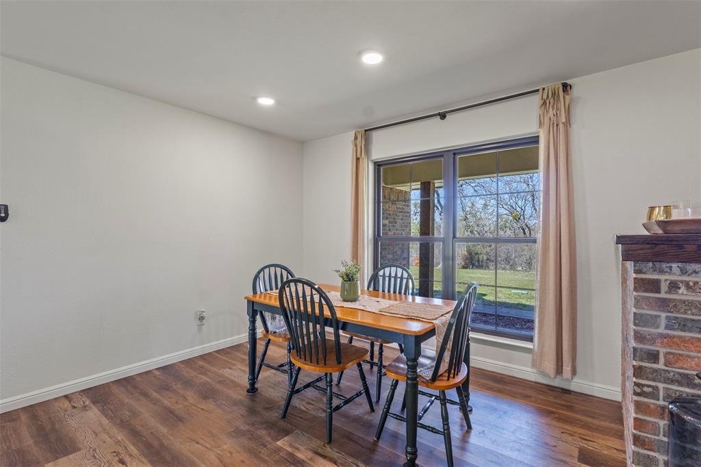 3009 Ranch House Road Willow Park, TX 76087 - Photo 7 of 40 a view of a dining room with furniture window and wooden floor