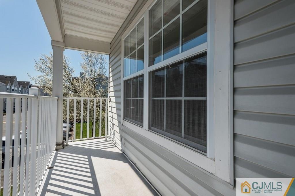 85 Prestwick Way, Unit 85 Edison, NJ 08820 - Photo 15 of 18 a view of a door and a window