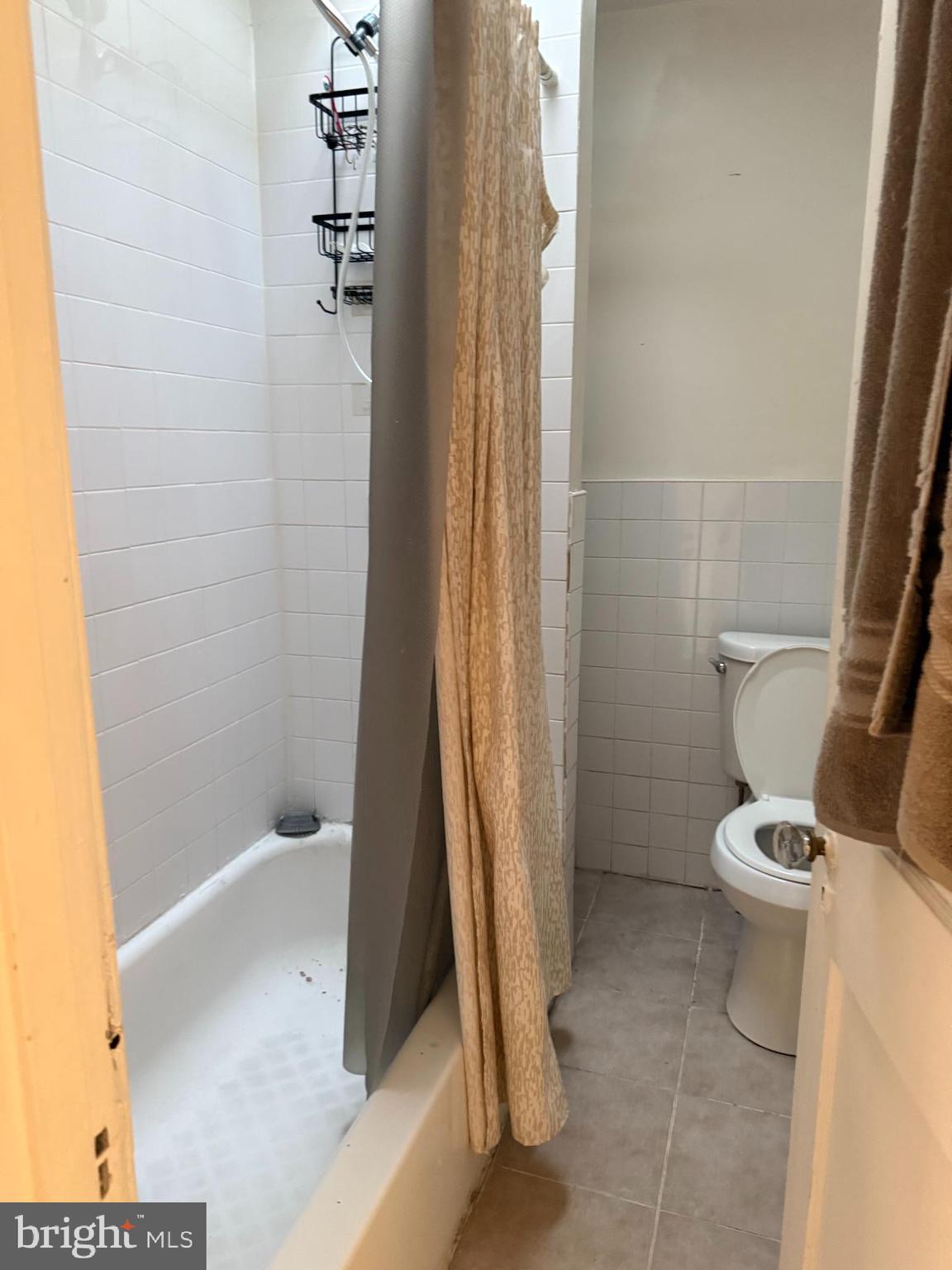 411 Timberlake Road Upper Darby, PA 19082 - Photo 9 of 15 a bathroom with a toilet and a shower
