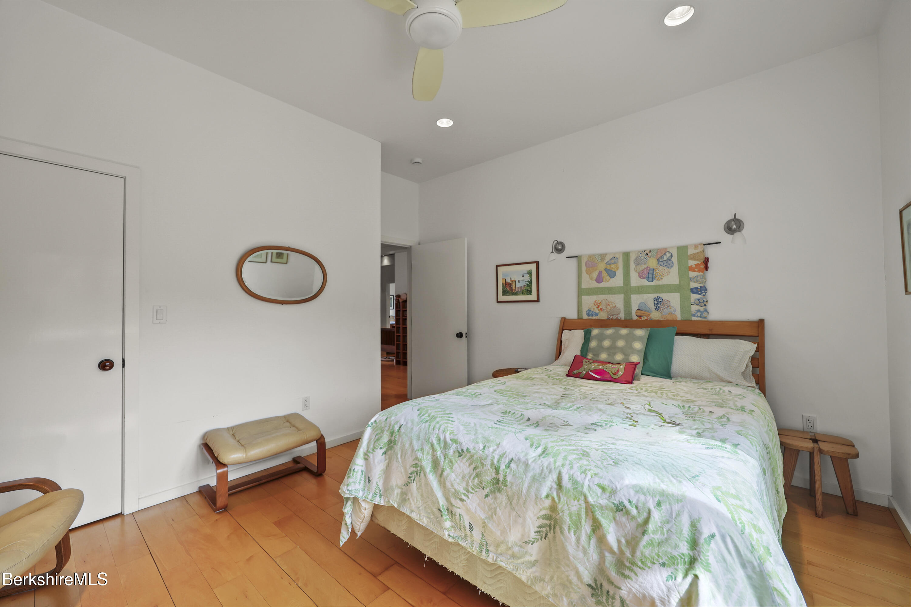 123 Jug End Road Egremont, MA 01230 - Photo 21 of 28 a bedroom with a bed and a chair