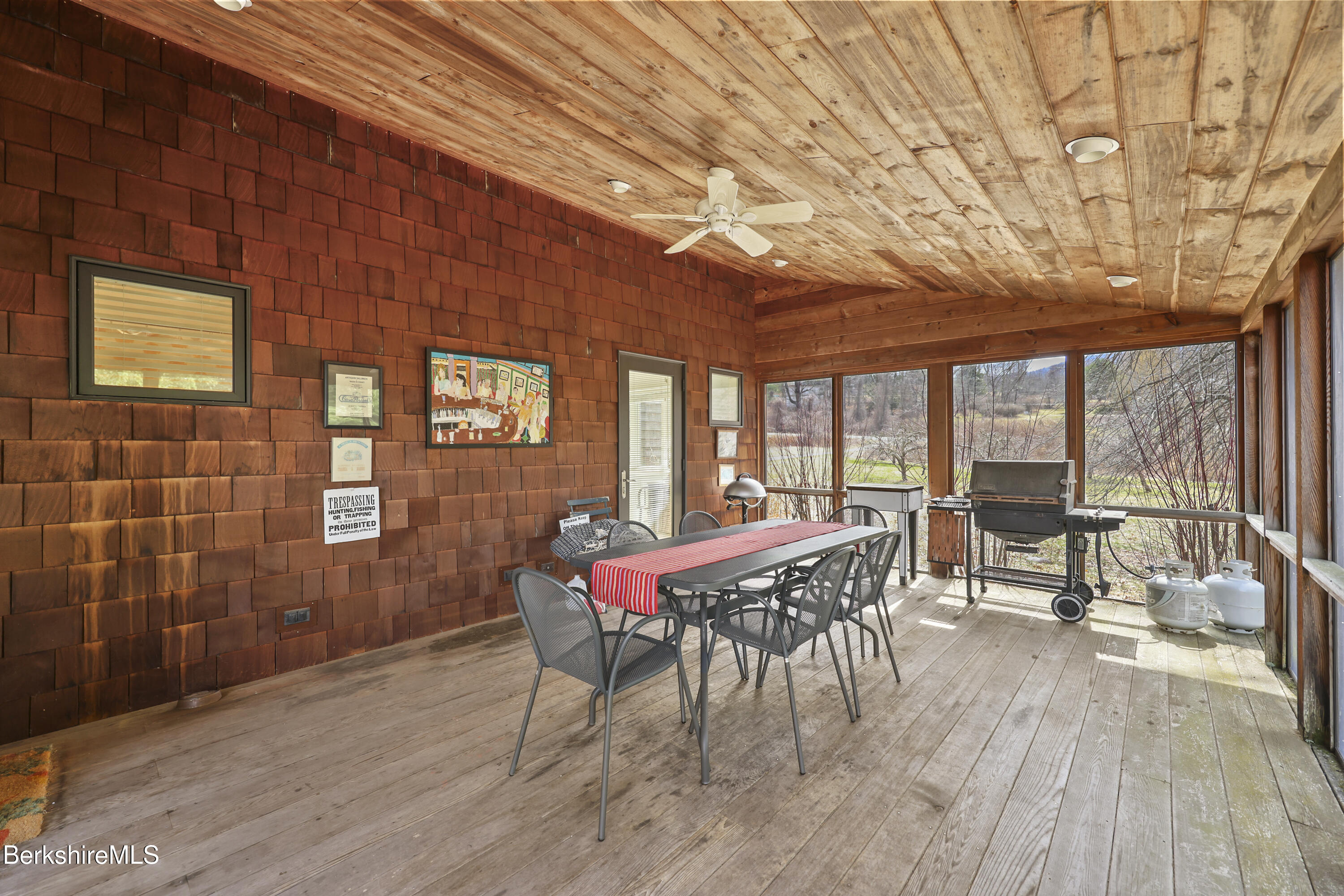 123 Jug End Road Egremont, MA 01230 - Photo 24 of 28 a view of a dining room with furniture window and wooden floor