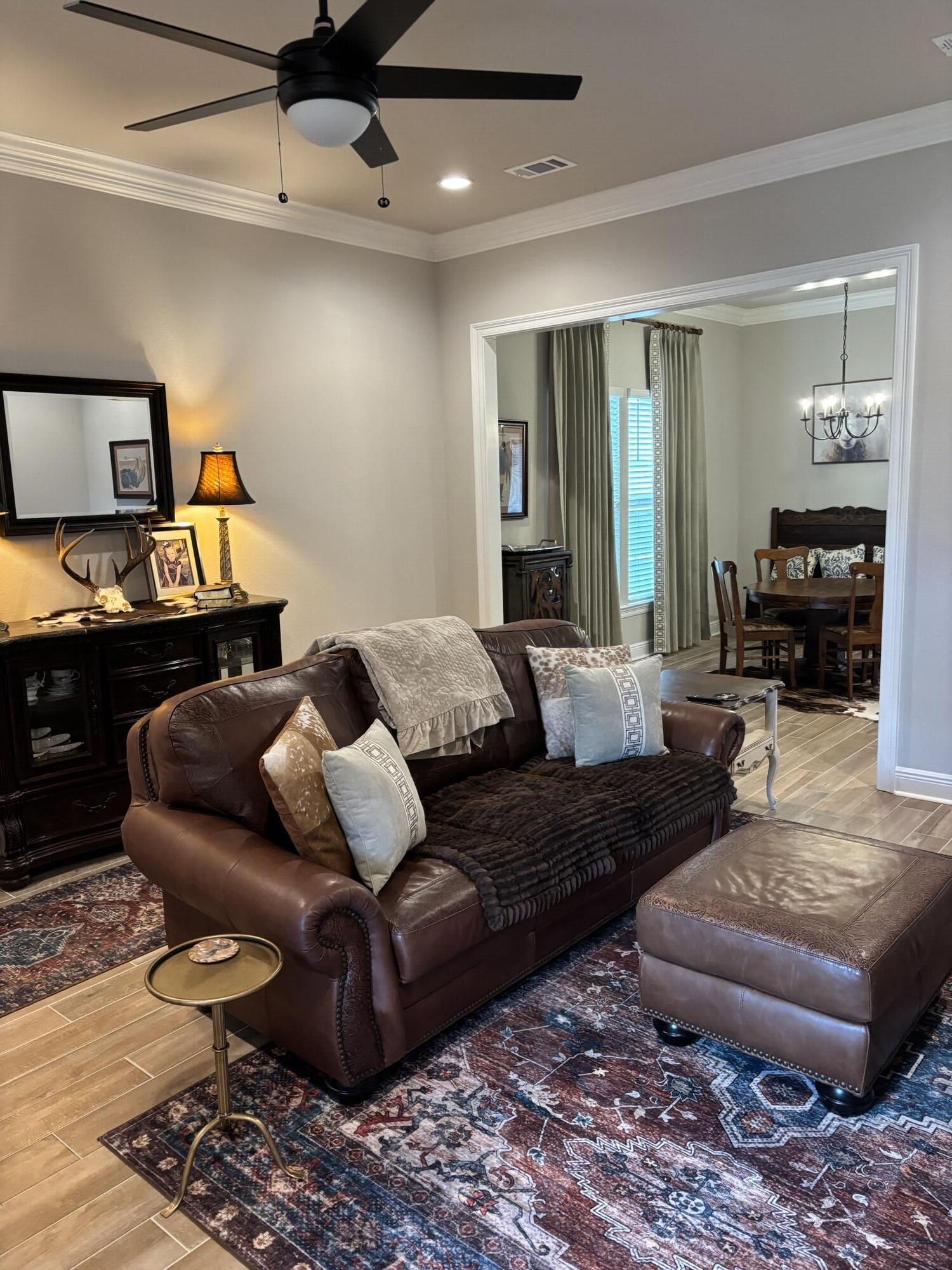 160 Hydrangea Boulevard Freeport, FL 32439 - Photo 3 of 6 a living room with furniture and wooden floor