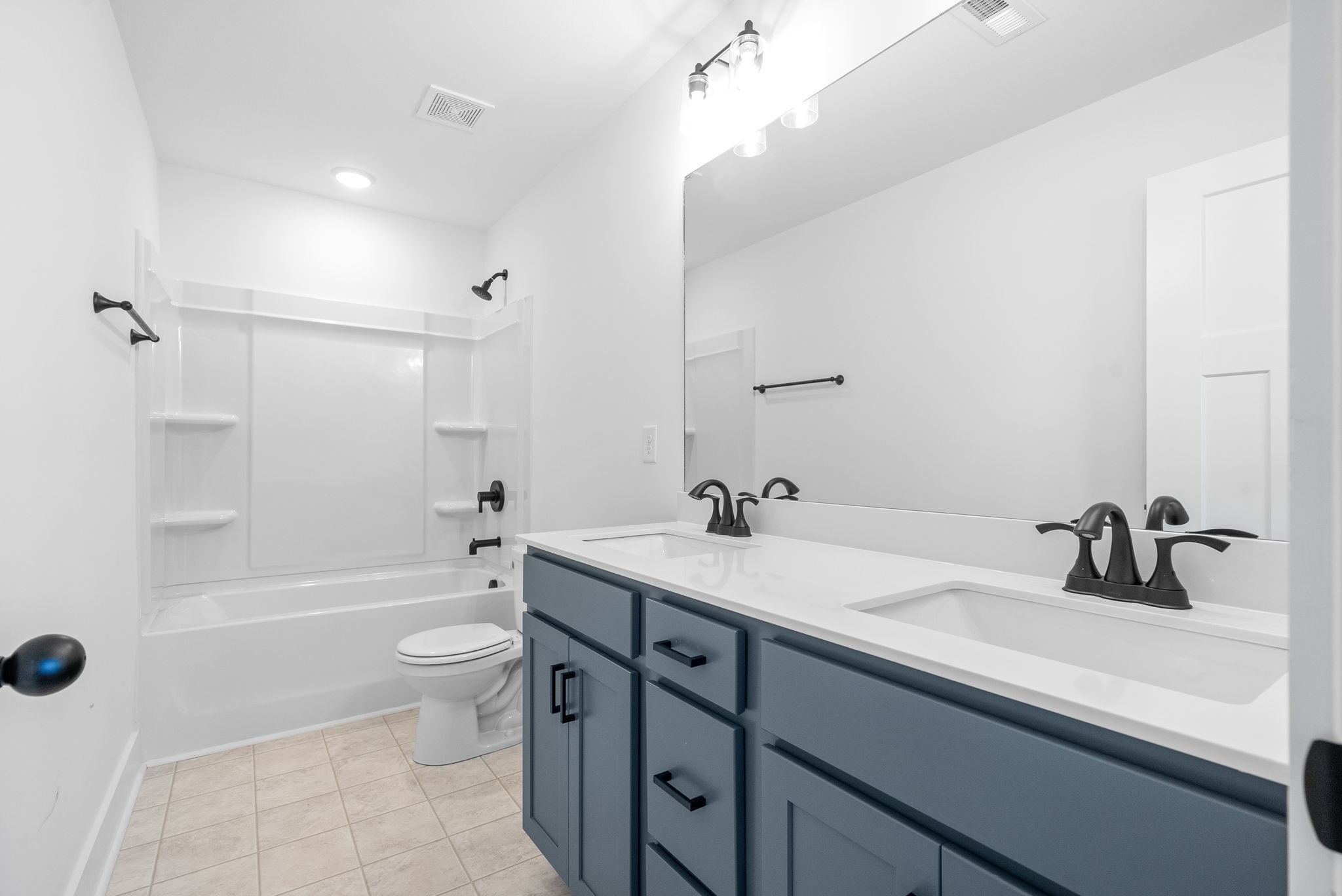 310 Front Ridge Circle Clarksville, TN 37040 - Photo 17 of 35 a bathroom with a sink a toilet and shower