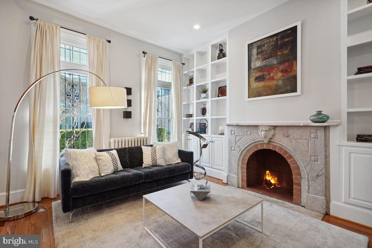 413 U Street Northwest Washington, DC 20001 - Photo 10 of 67 Living room w/custom built shelves and fireplace