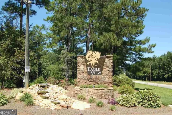 a view of a backyard of the house