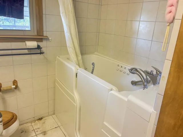 a bathroom with a sink and a tub