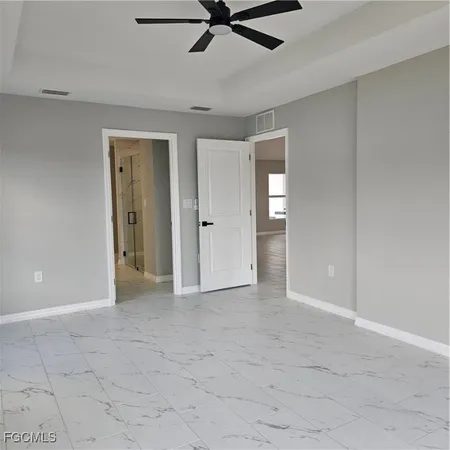 a view of a kitchen with a sink and a stove top oven