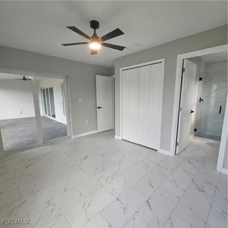 a bathroom with a sink toilet a mirror and shower