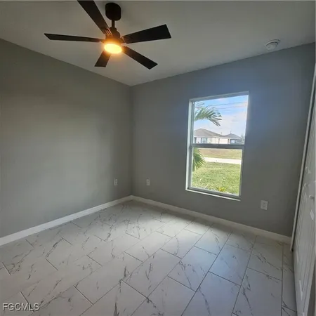 a view of a large window with an outdoor space