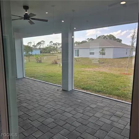a view of an empty room and window