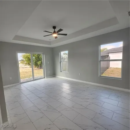 a spacious bathroom with a double vanity sink and a mirror