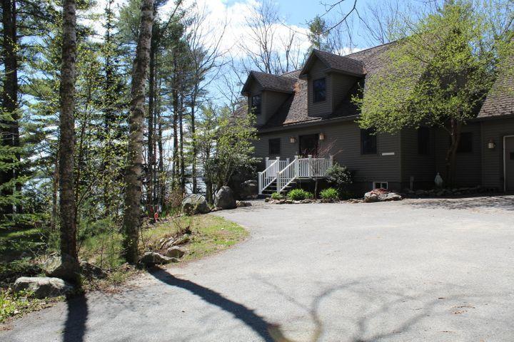 63 Dwelly Point Road Franklin, ME 04634 - Photo 41 of 58 Front view in spring