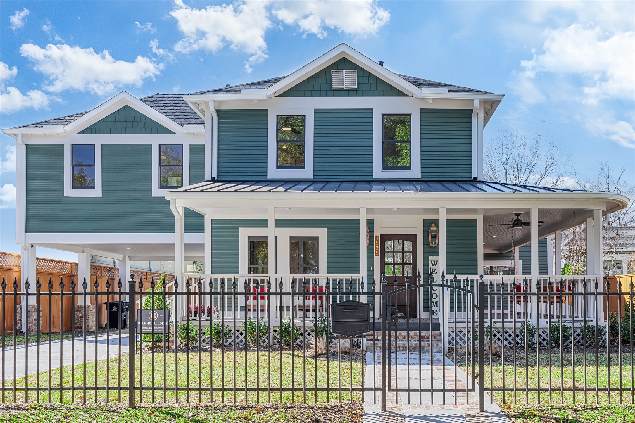 1535 Rutland Street Houston, TX 77008 - Photo 1 of 50 a front view of a house with a porch