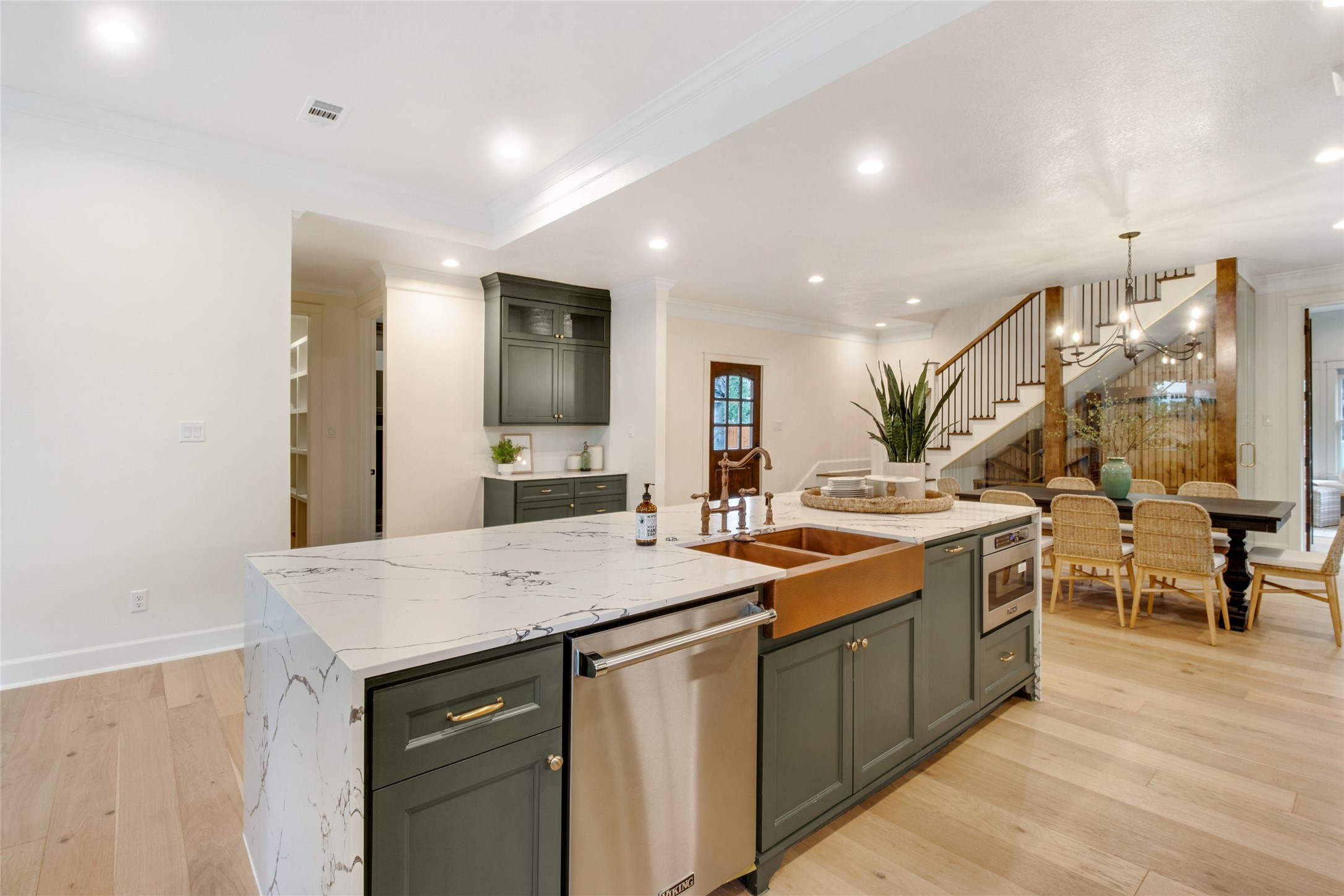 1535 Rutland Street Houston, TX 77008 - Photo 18 of 50 a kitchen with a sink and stove