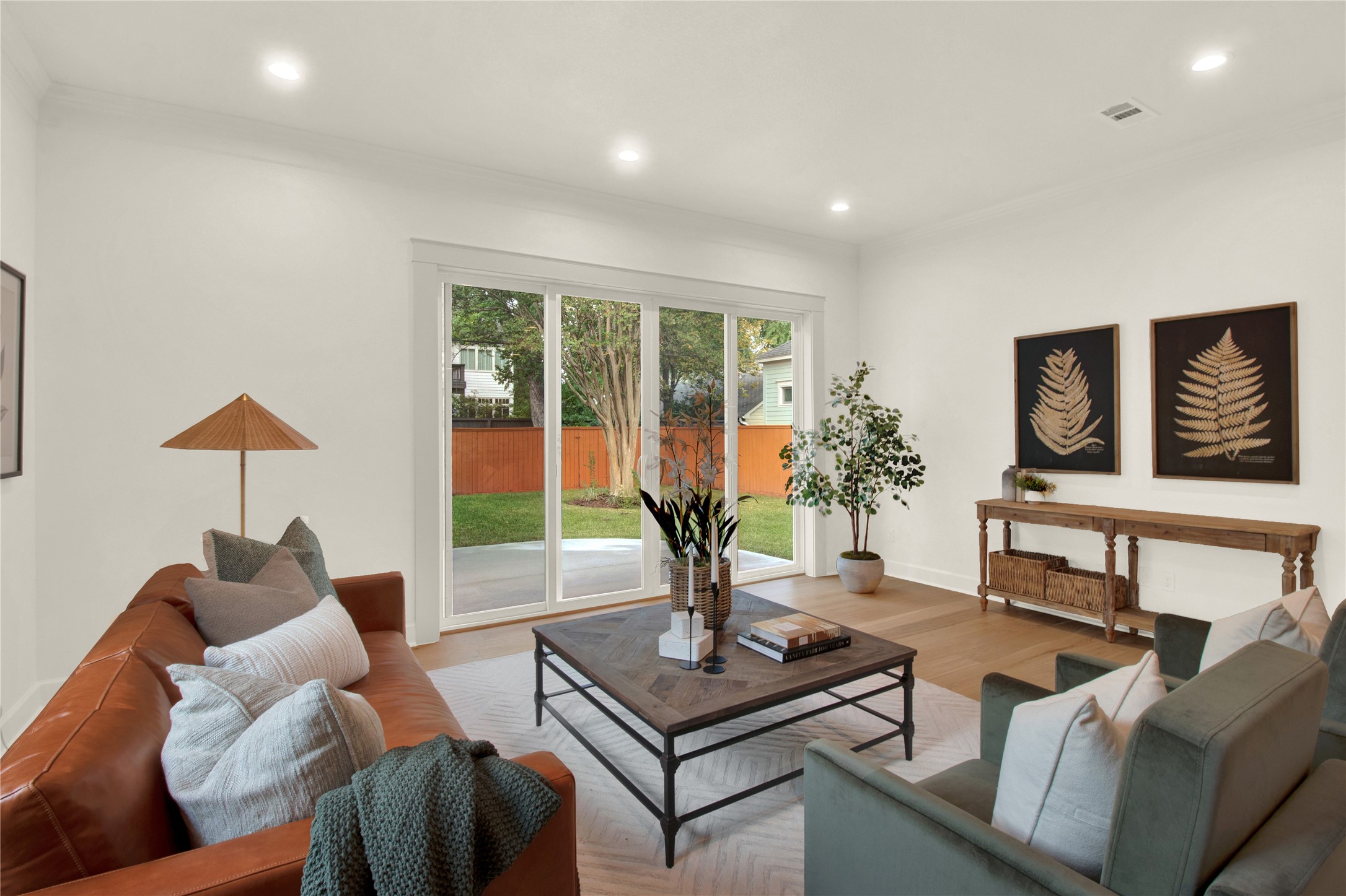 1535 Rutland Street Houston, TX 77008 - Photo 22 of 50 a living room with furniture and a large window