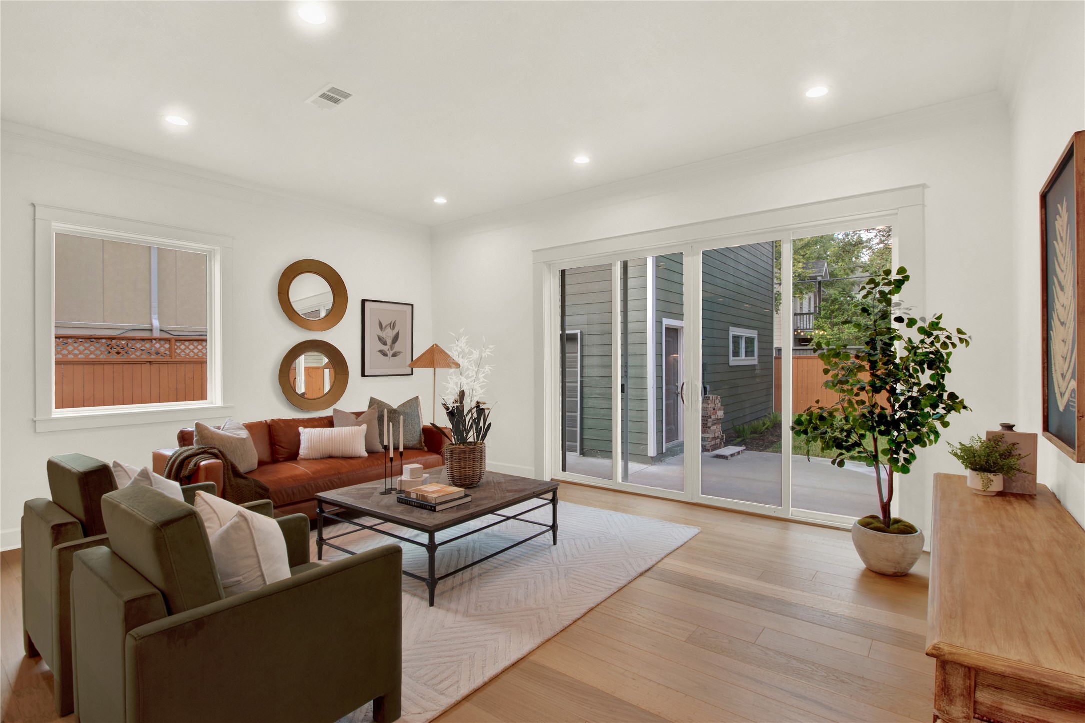 1535 Rutland Street Houston, TX 77008 - Photo 23 of 50 a living room with furniture and a large window