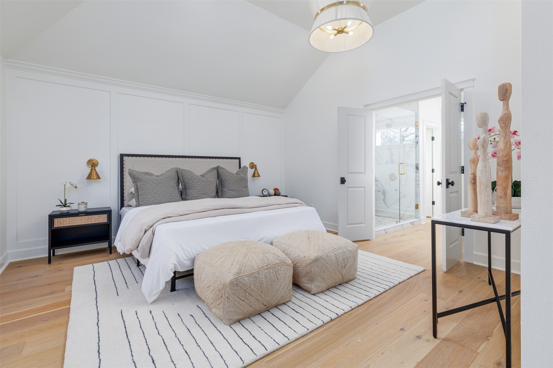 1535 Rutland Street Houston, TX 77008 - Photo 26 of 50 a bedroom with a bed and a chandelier