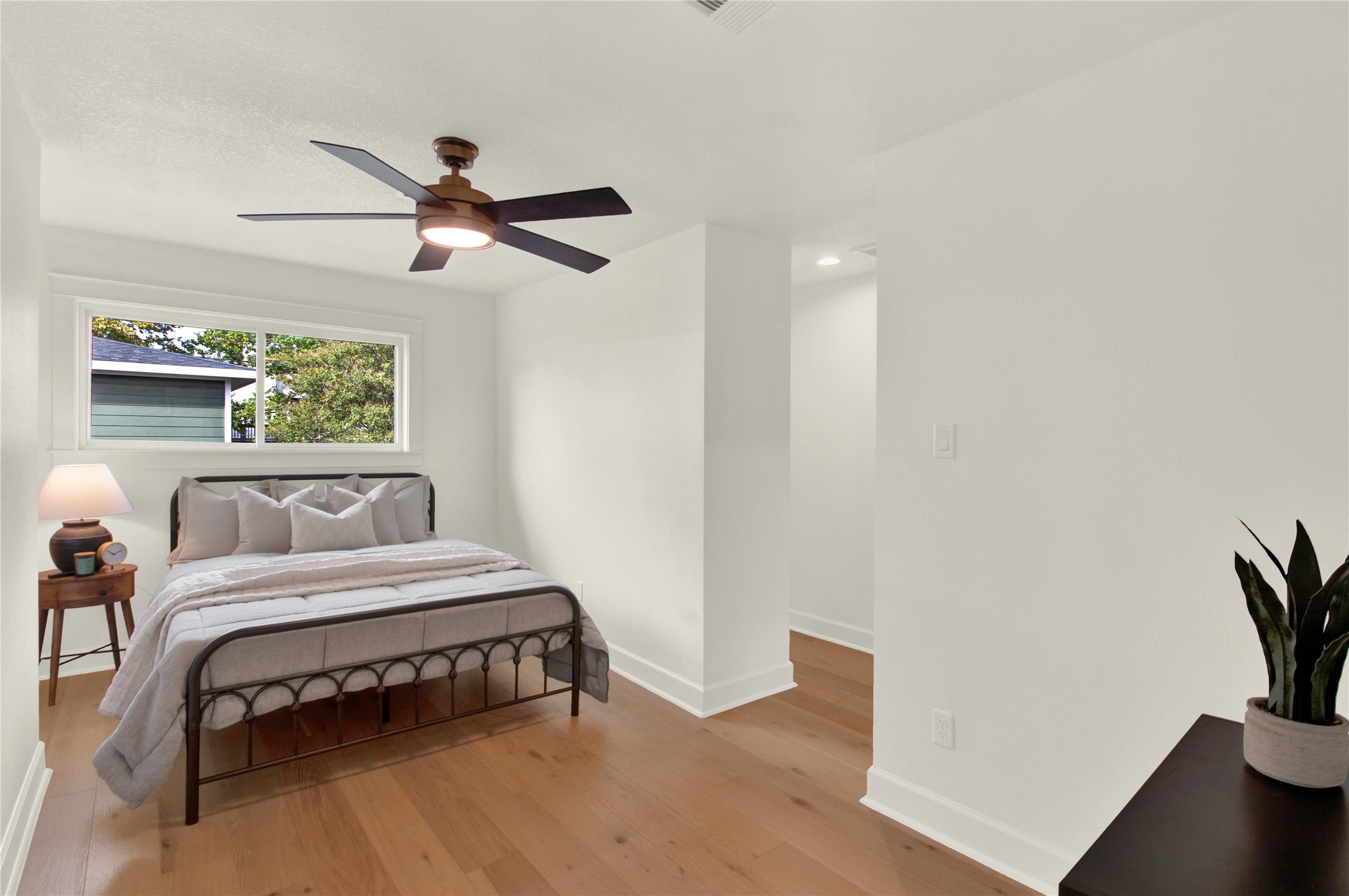 1535 Rutland Street Houston, TX 77008 - Photo 36 of 50 a bedroom with a bed and a window