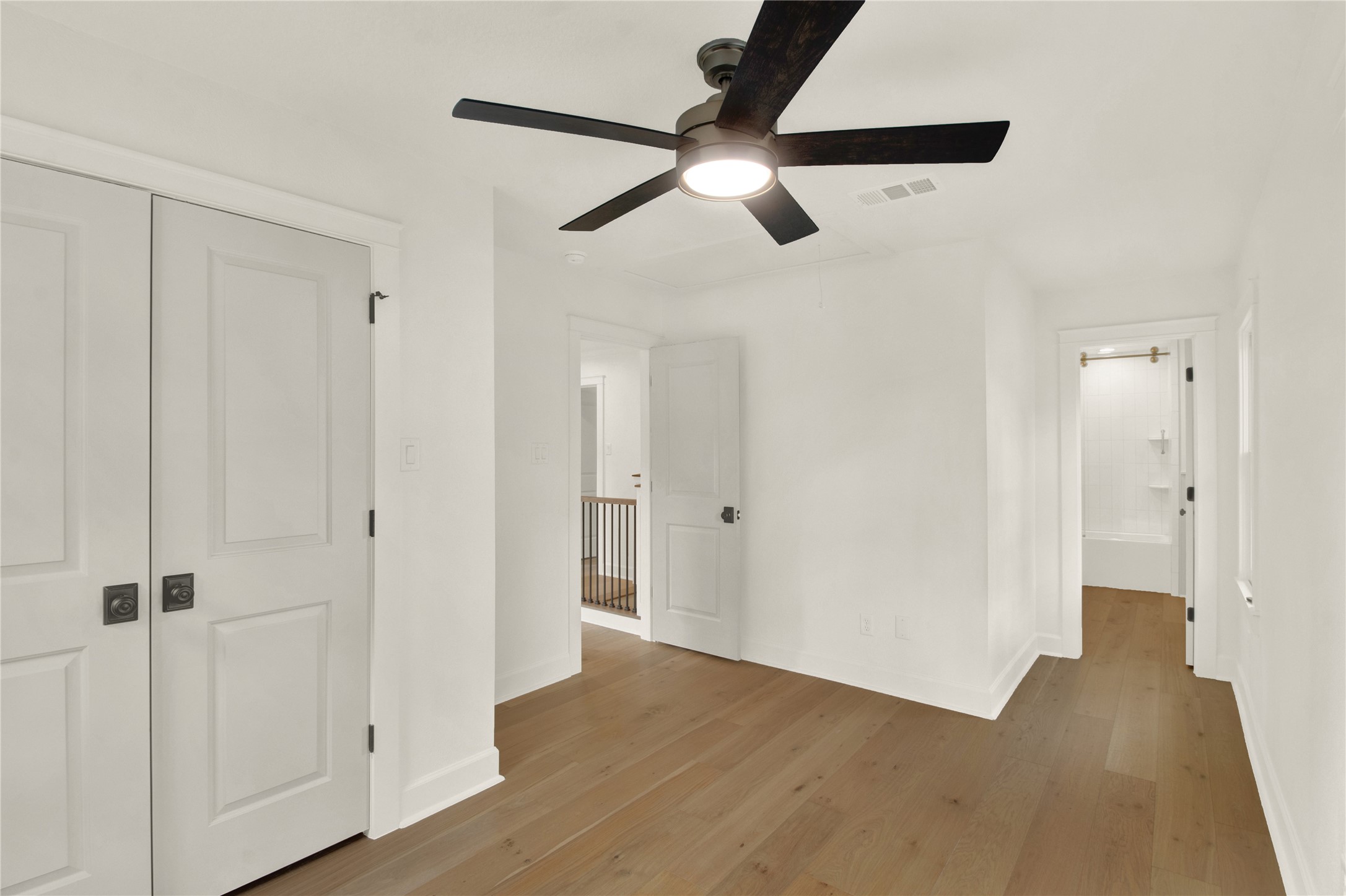 1535 Rutland Street Houston, TX 77008 - Photo 37 of 50 a view of a hallway with wooden floor